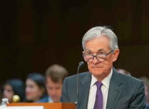Fed Chair Powell Signals No Immediate Rate Cuts Amid Inflation Concerns